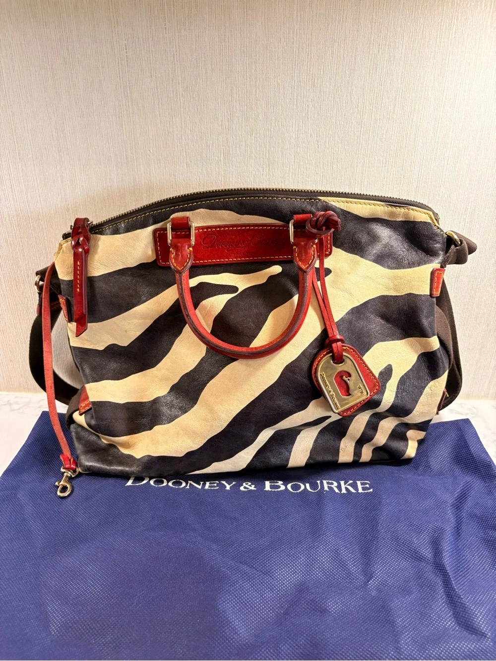 Dooney & Bourke Black and Cream Zebra Satchel with Red Trim